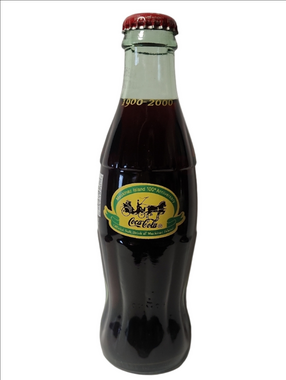 Coca-Cola Commemorative 1900-2000 Bottle with Red Cap and Green Neck